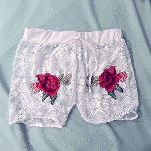 Sexy lace shorts with flower appliqués
